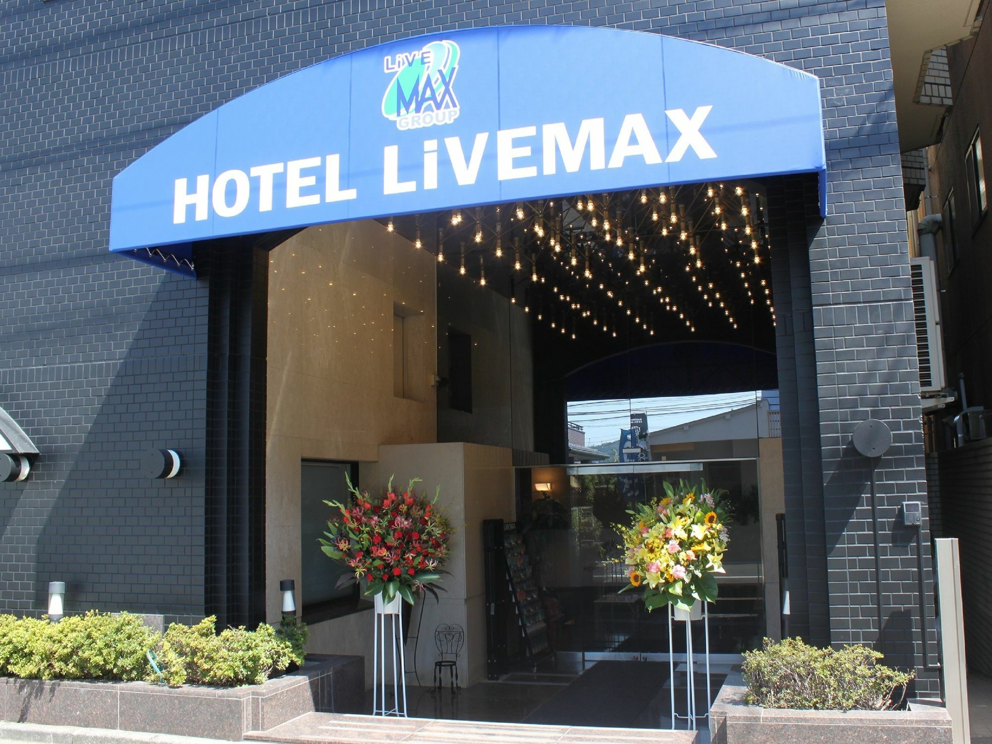 Hotel Livemax Budget Tokyo Hamura Ekimae Екстер'єр фото